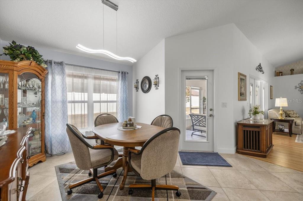 9957 Southwest 55th Ave Road Ocala, FL 34476 - Photo 12 of 41 a dining room with furniture and window
