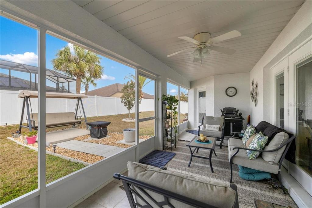 9957 Southwest 55th Ave Road Ocala, FL 34476 - Photo 28 of 41 a living room with furniture and a large window