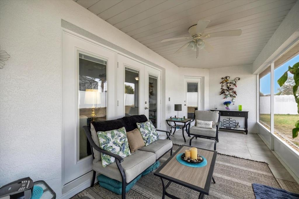 9957 Southwest 55th Ave Road Ocala, FL 34476 - Photo 29 of 41 a living room with furniture and a large window