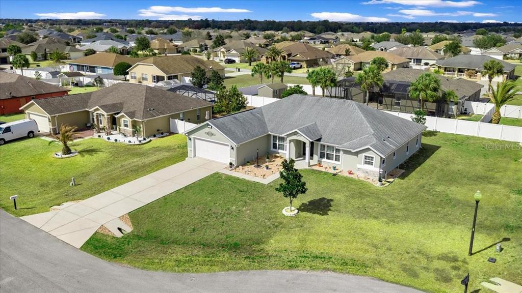 9957 Southwest 55th Ave Road Ocala, FL 34476 - Photo 30 of 41 an aerial view of residential houses with outdoor space and trees