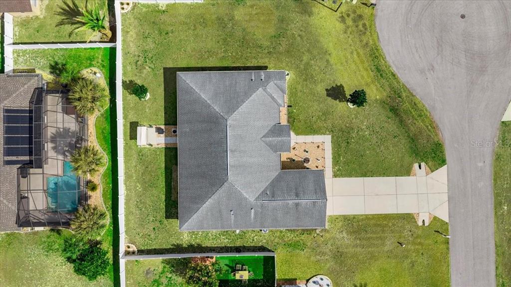 9957 Southwest 55th Ave Road Ocala, FL 34476 - Photo 35 of 41 an aerial view of a house with a yard