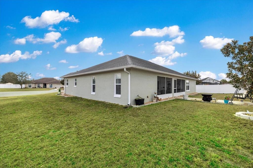 9957 Southwest 55th Ave Road Ocala, FL 34476 - Photo 39 of 41 a view of a house with backyard