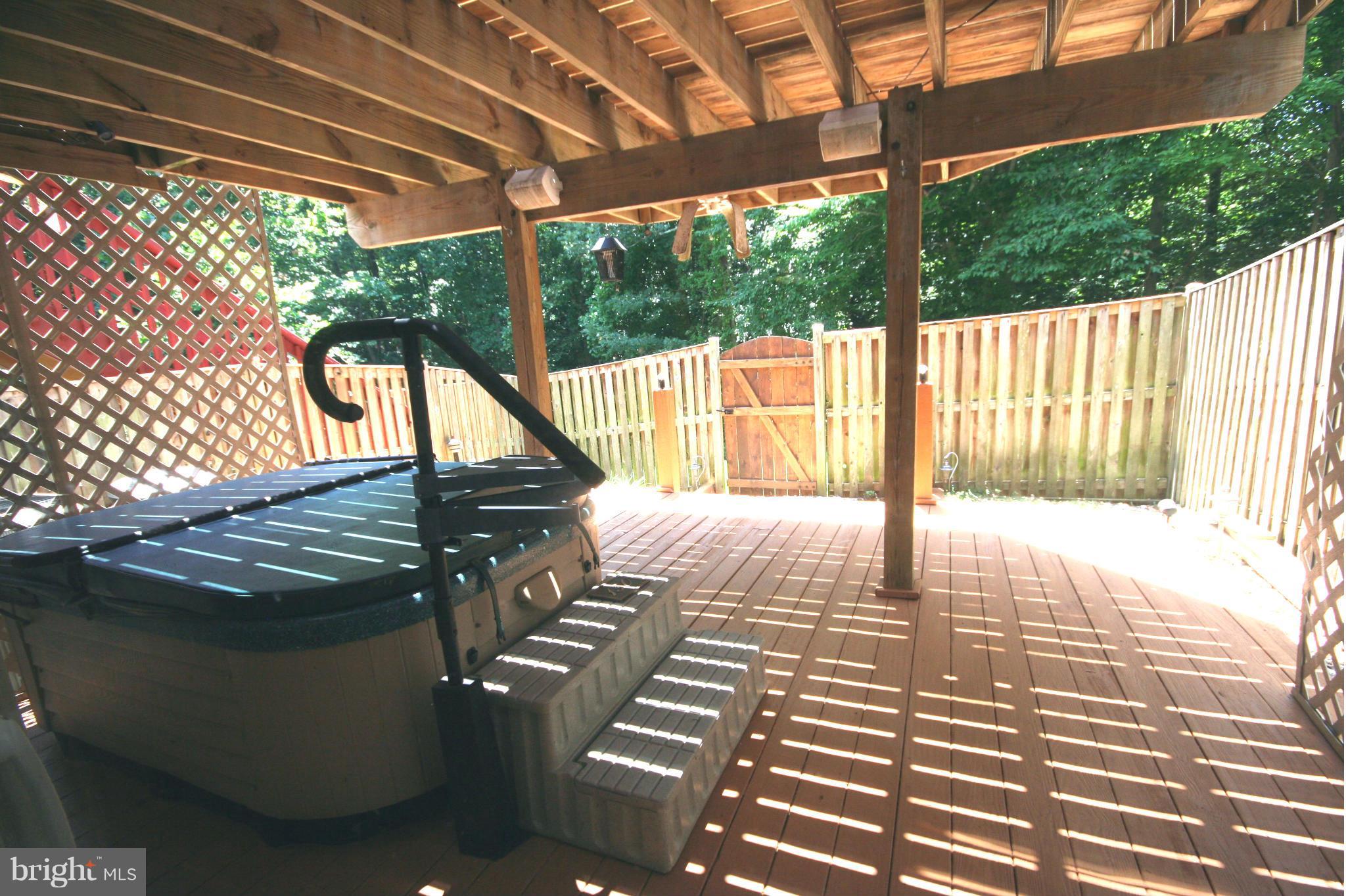 7467 Ridge Oak Court Springfield, VA 22153 - Photo 20 of 24 Newly stained lower deck with hot tub