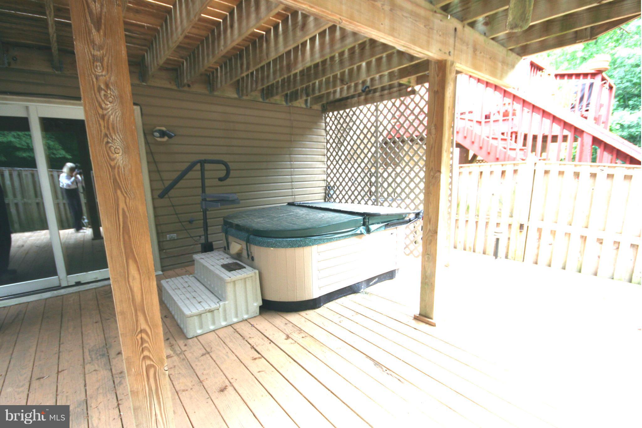 7467 Ridge Oak Court Springfield, VA 22153 - Photo 21 of 24 Hot tub on lower deck will convey