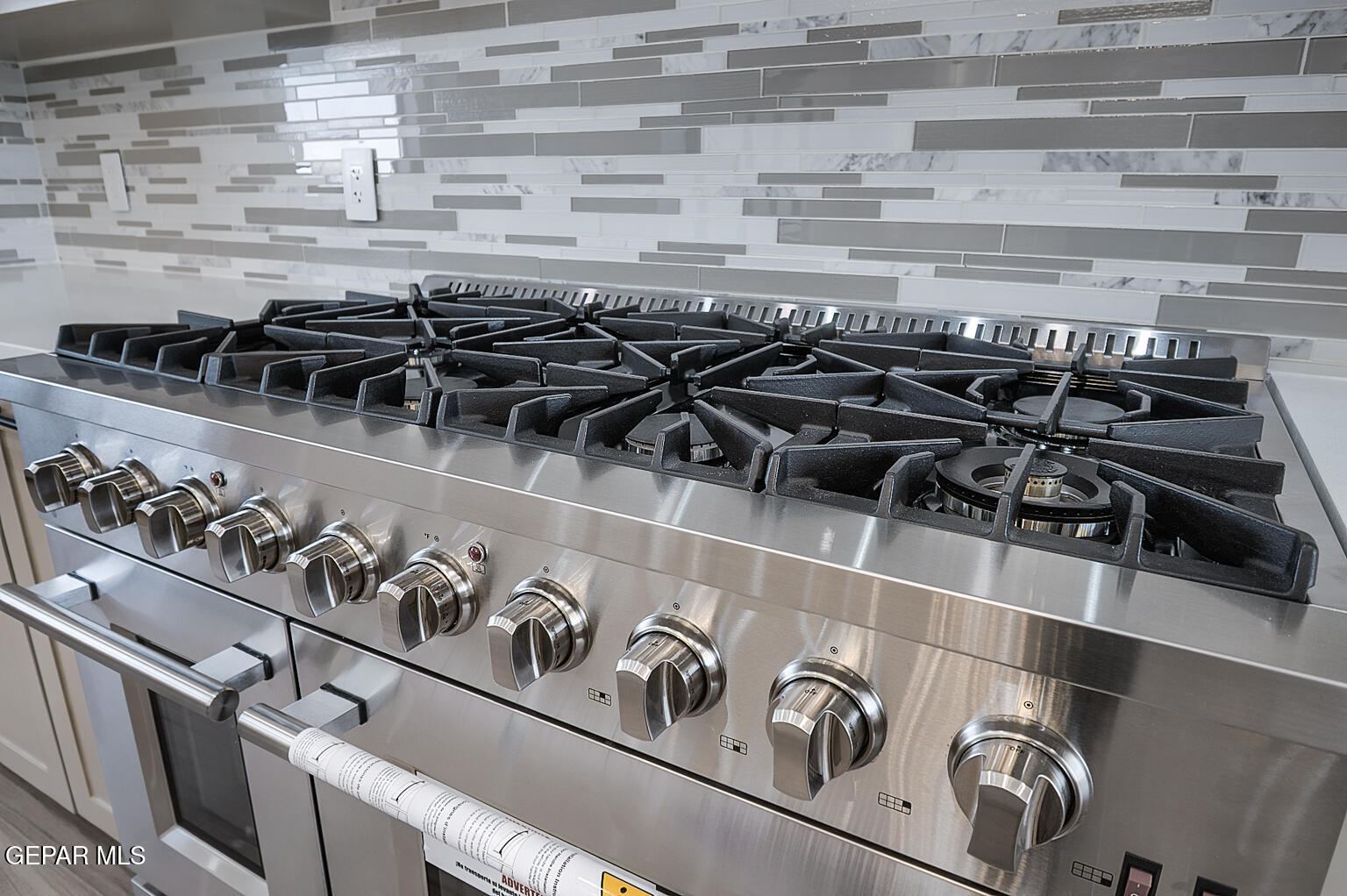 6035 Dusty Prints Road Las Cruces, NM 88007 - Photo 22 of 61 6025-Dusty-Prints-Kitchen-Range (1)