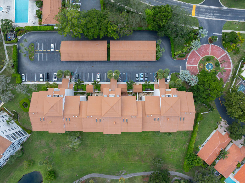 17031 Boca Club Boulevard, Unit 65A Boca Raton, FL 33487 - Photo 33 of 34 an aerial view of house with yard swimming pool and outdoor seating