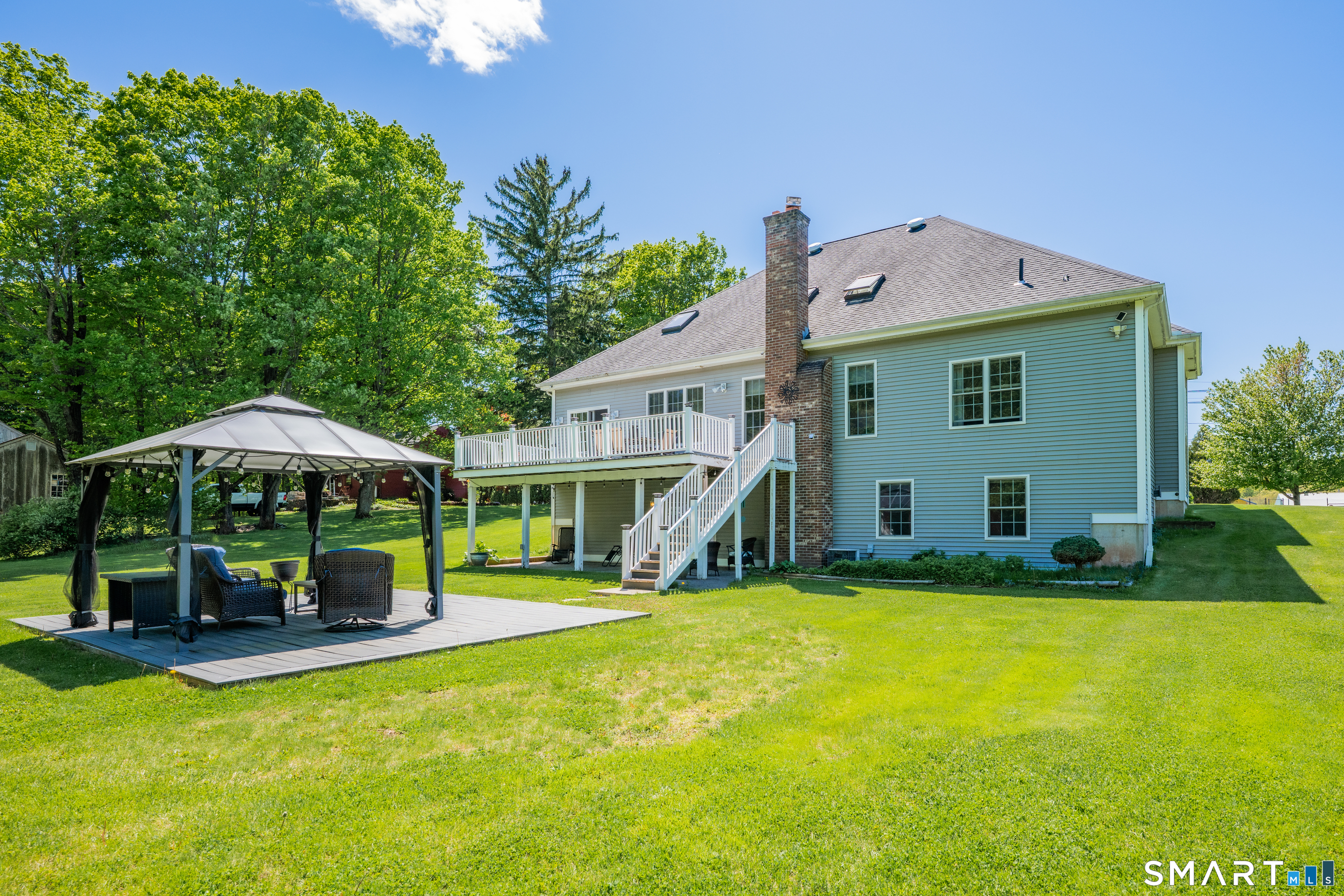 409 Beckley Road Berlin, CT 06037 - Photo 37 of 39 a view of a house with a yard patio and swimming pool