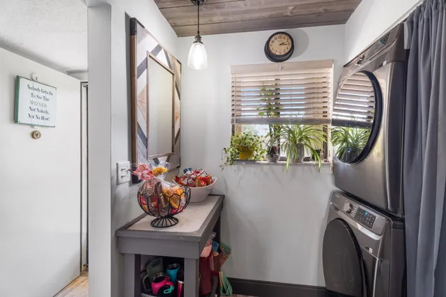 a view of entryway with furniture and flower pot