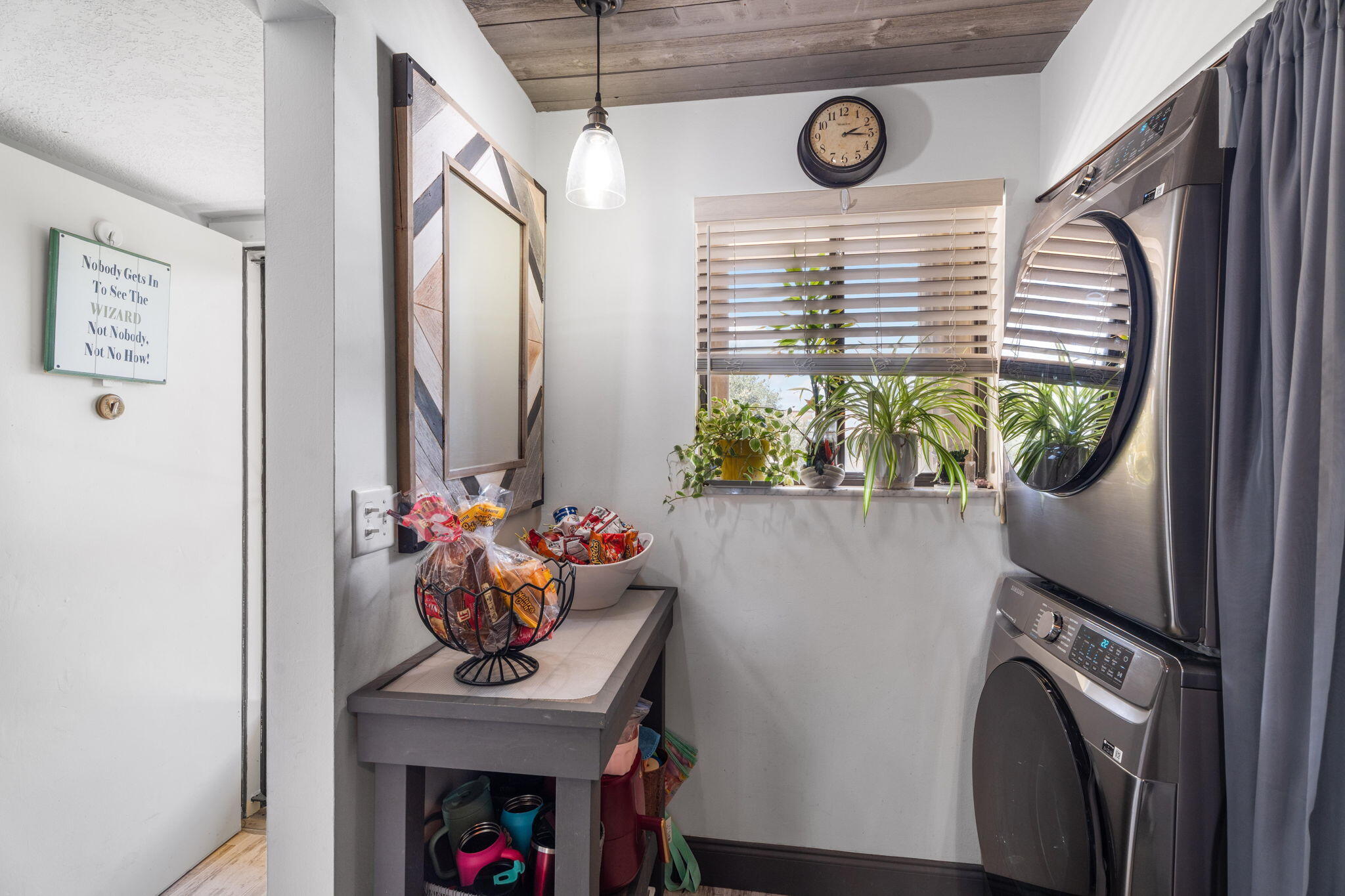 5383 Southeast Miles Grant Road, Unit B206 Stuart, FL 34997 - Photo 16 of 17 a view of entryway with furniture and flower pot