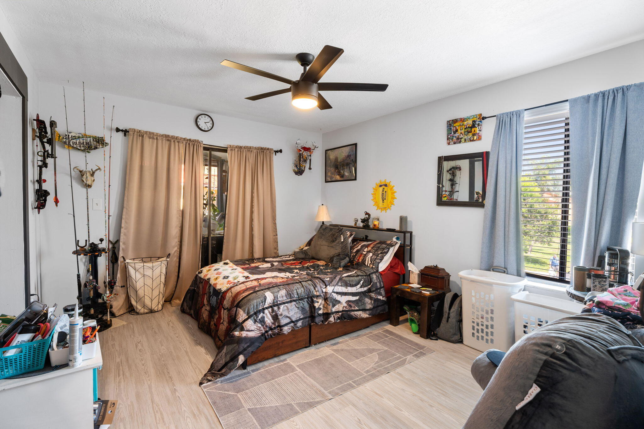 5383 Southeast Miles Grant Road, Unit B206 Stuart, FL 34997 - Photo 4 of 17 a bed room with a bed and a window