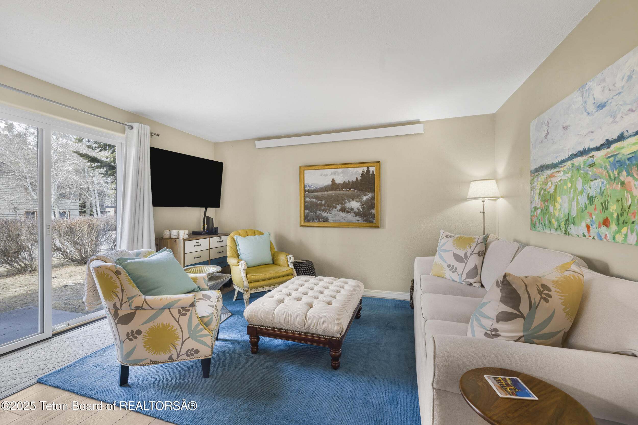 750 Powderhorn Lane, Unit H2 Jackson, WY 83001 - Photo 1 of 16 Living Room with Access to Patio