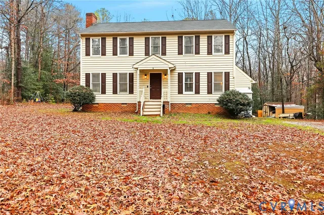front view of a house with a patio