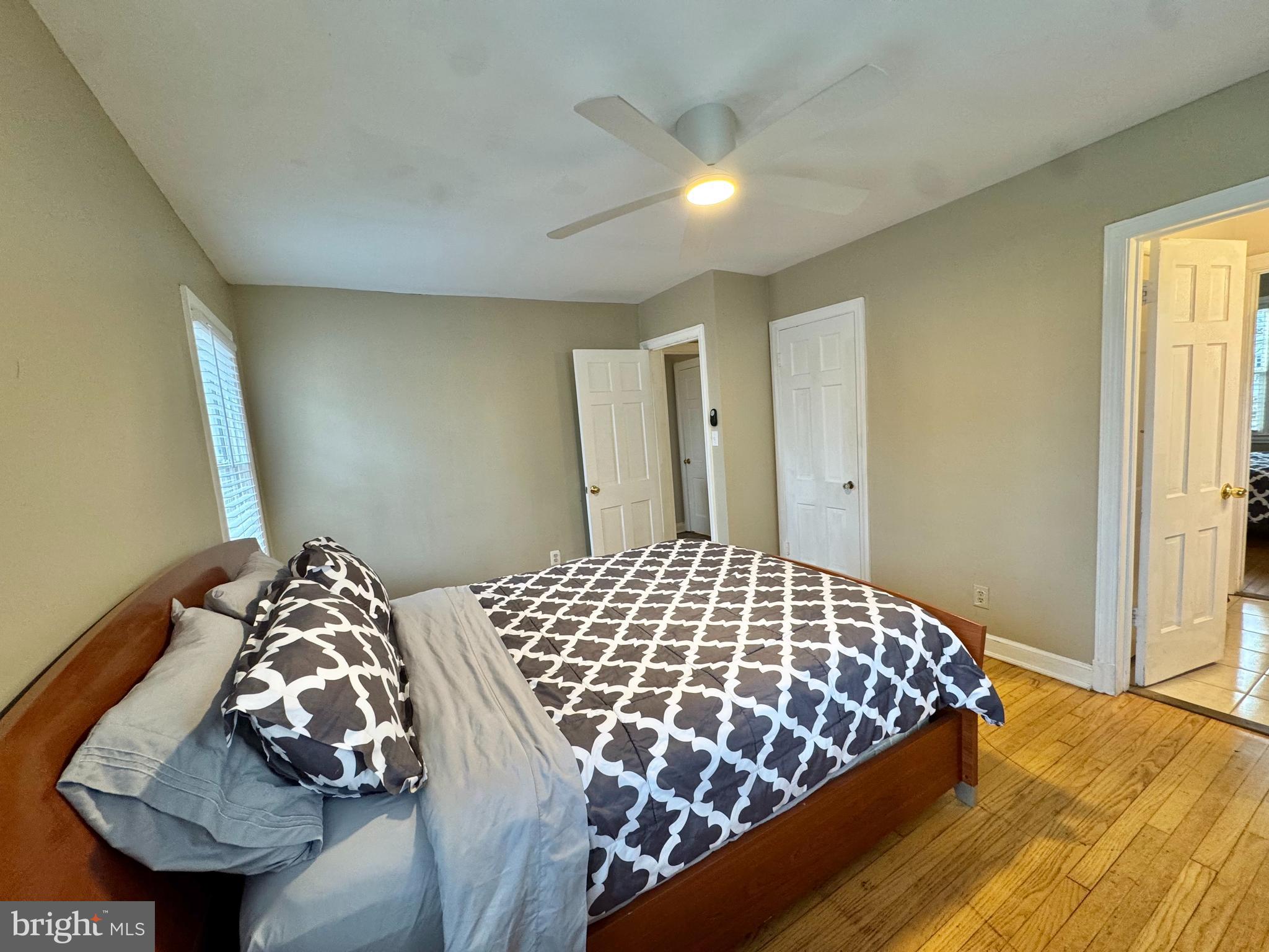 8815 Reading Road Silver Spring, MD 20901 - Photo 18 of 56 a bedroom with a bed and a window