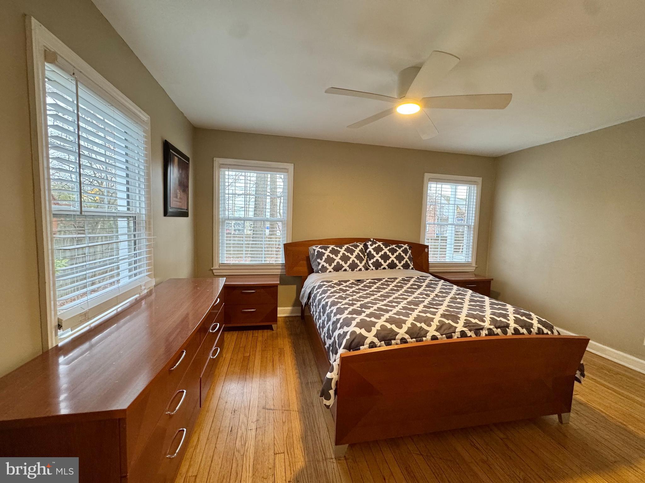 8815 Reading Road Silver Spring, MD 20901 - Photo 19 of 56 a bedroom with a bed and window