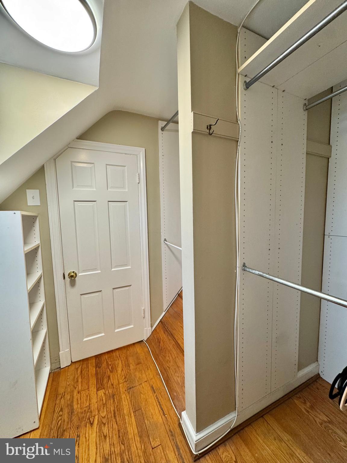 8815 Reading Road Silver Spring, MD 20901 - Photo 34 of 56 a view of walk in closet with wooden floor