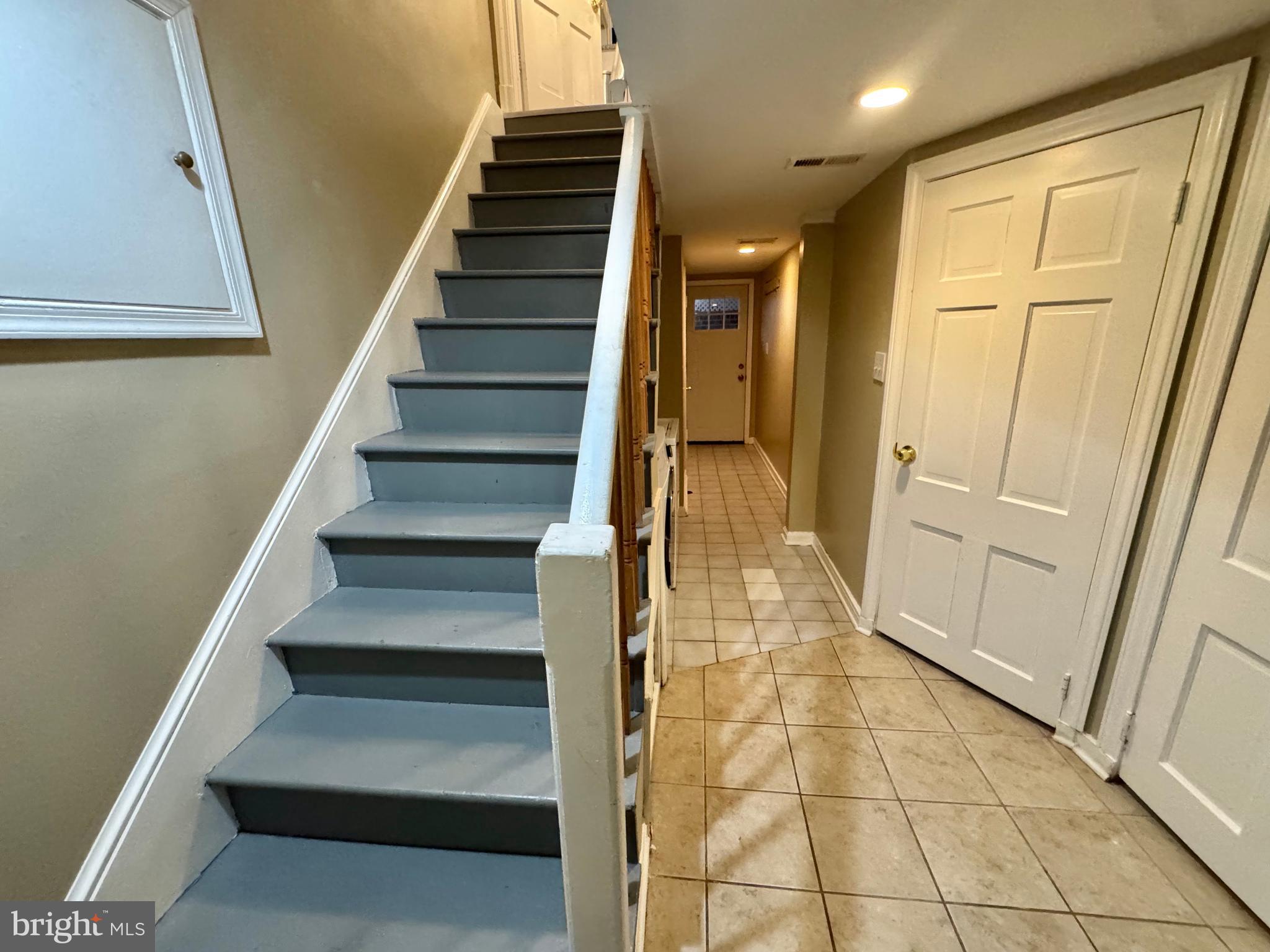 8815 Reading Road Silver Spring, MD 20901 - Photo 43 of 56 a view of entryway and hall with wooden floor