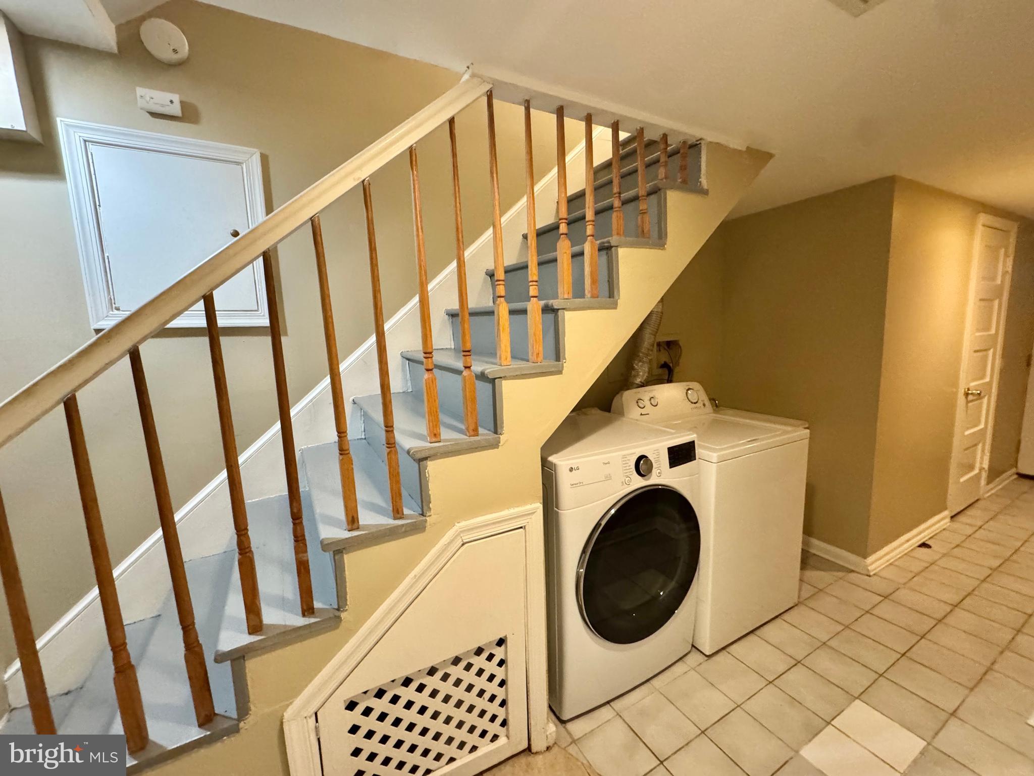8815 Reading Road Silver Spring, MD 20901 - Photo 44 of 56 a view of entryway with washer and dryer
