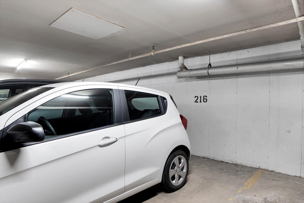 500 West Huntington Commons Road, Unit 448 Mount Prospect, IL 60056 - Photo 21 of 26 a utility room with dryer and washer