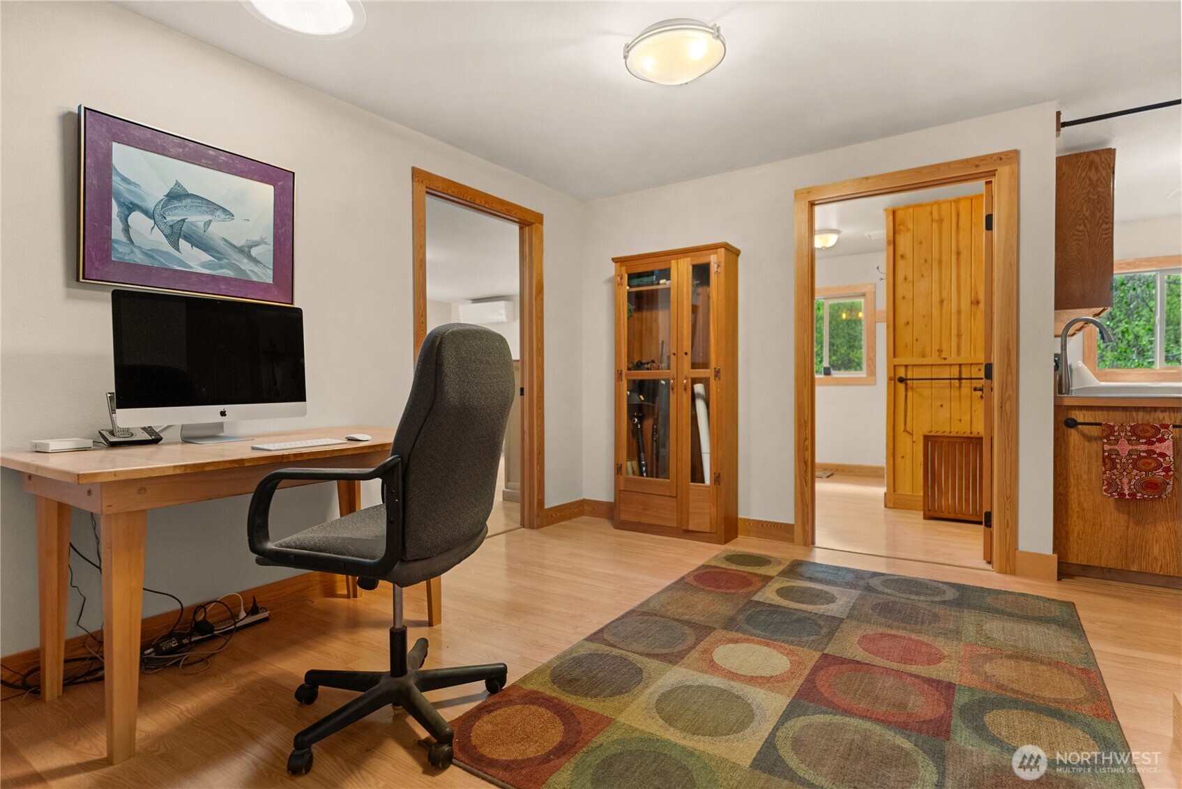 446 Rendezvous Road Winthrop, WA 98862 - Photo 14 of 40 a view of a workspace with furniture and a window
