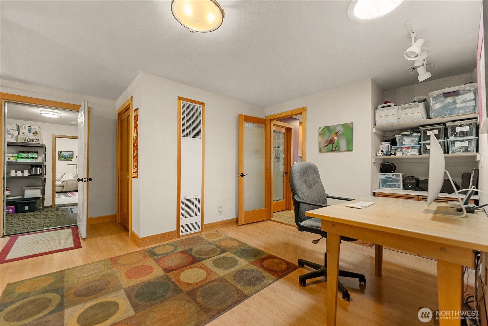 446 Rendezvous Road Winthrop, WA 98862 - Photo 15 of 40 a view of a workspace with furniture and a bedroom