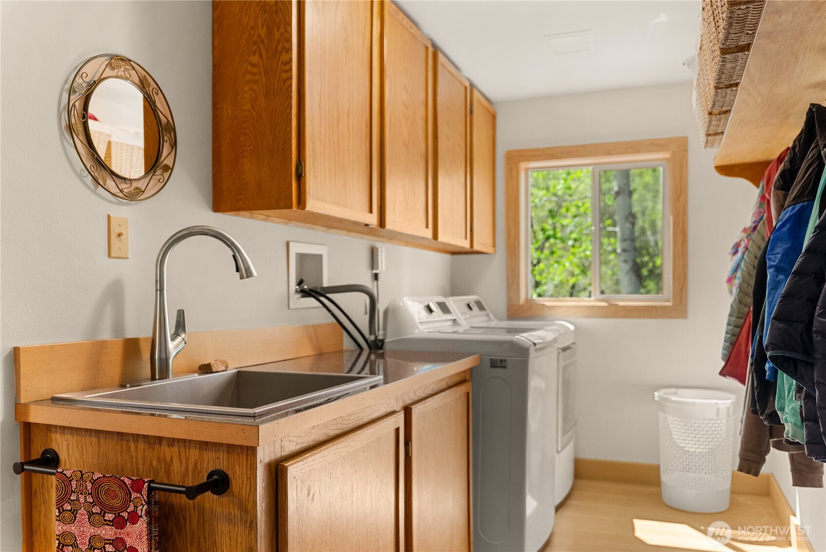 446 Rendezvous Road Winthrop, WA 98862 - Photo 23 of 40 a kitchen with a sink a stove and a window