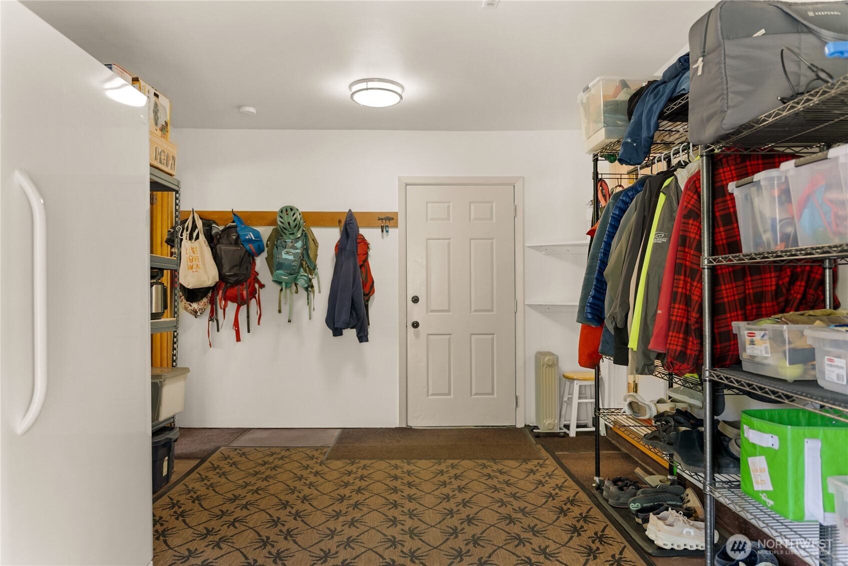 446 Rendezvous Road Winthrop, WA 98862 - Photo 24 of 40 a view of walk in closet with clothes and shoes