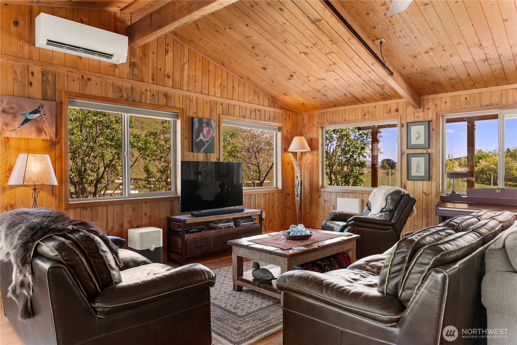 446 Rendezvous Road Winthrop, WA 98862 - Photo 10 of 40 a living room with furniture and a flat screen tv