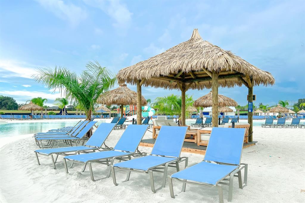 31590 Spanish Msn Road San Antonio, FL 33576 - Photo 21 of 26 a patio with a patio table and chairs