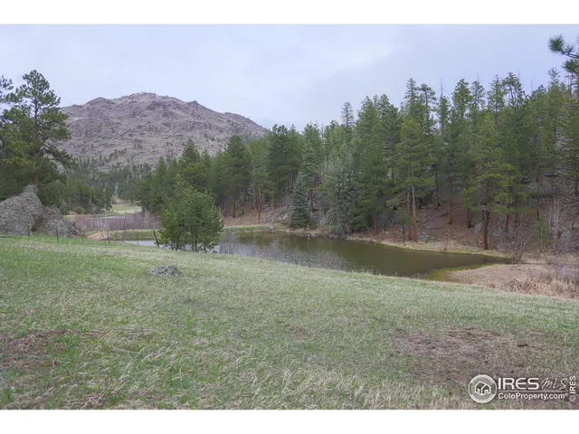 a view of an outdoor space and a lake view