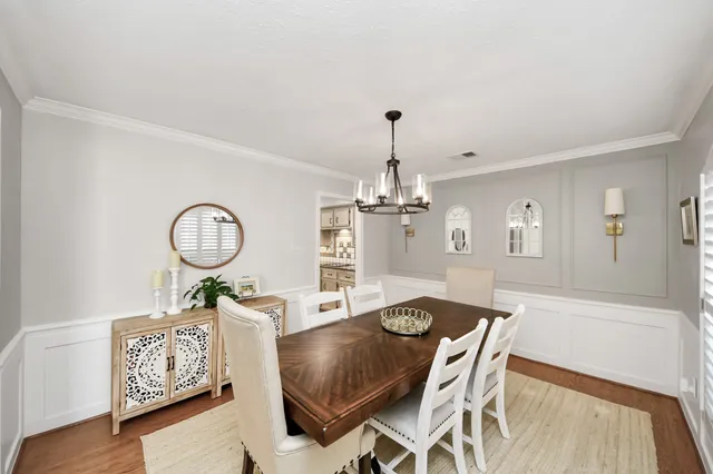 a spacious bedroom with a bed and window