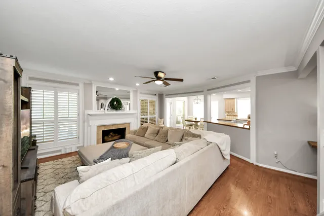 a view of walk in closet with clothes