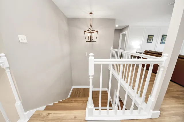 a view of a lake with sitting area