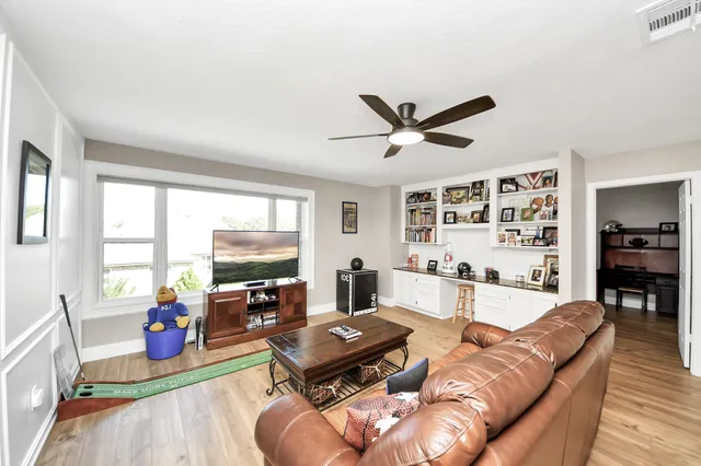 a view of a park with swings and slides