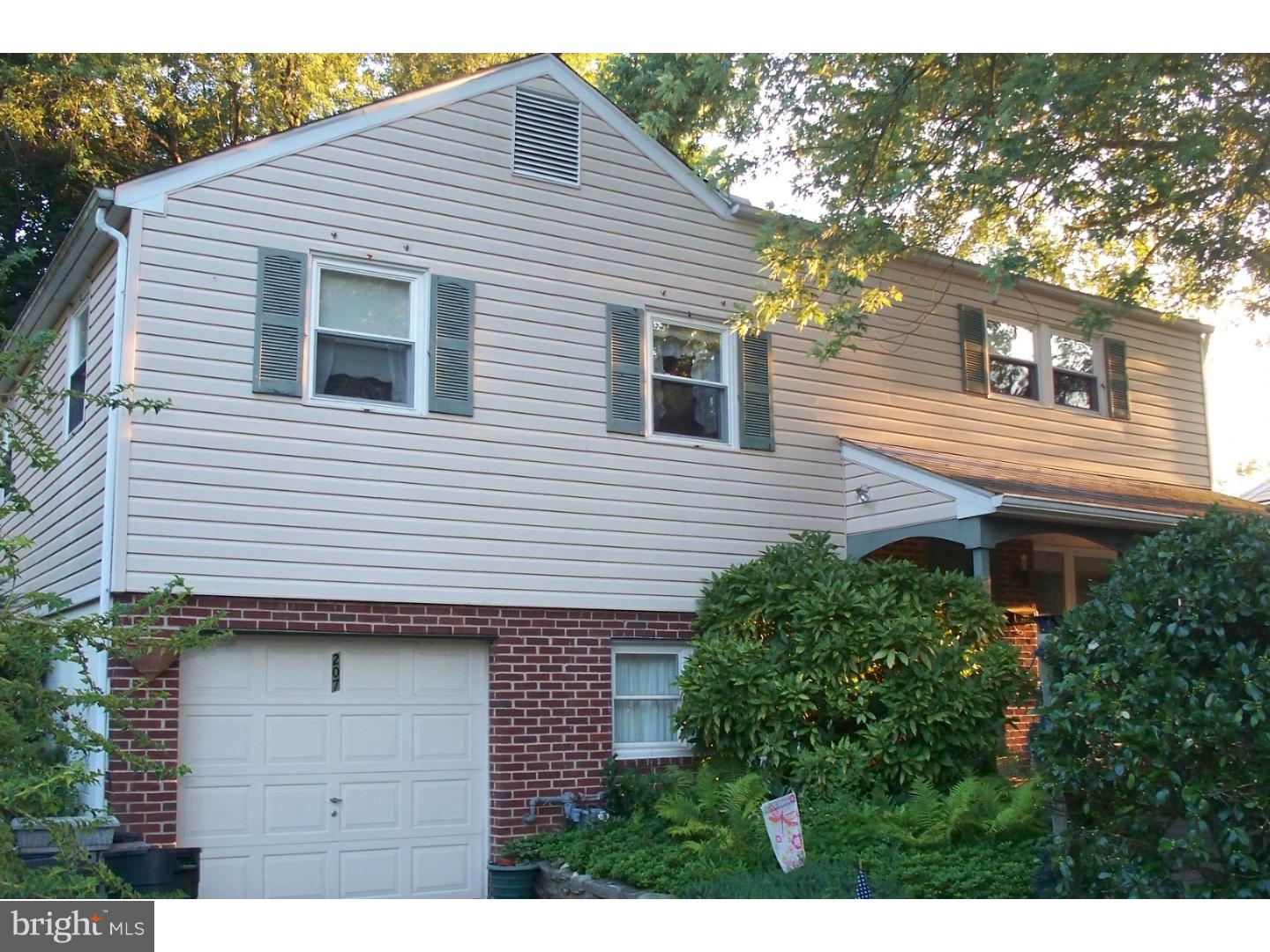 207 Spruce Road Flourtown, PA 19031 - Photo 1 of 19 a view of house with backyard