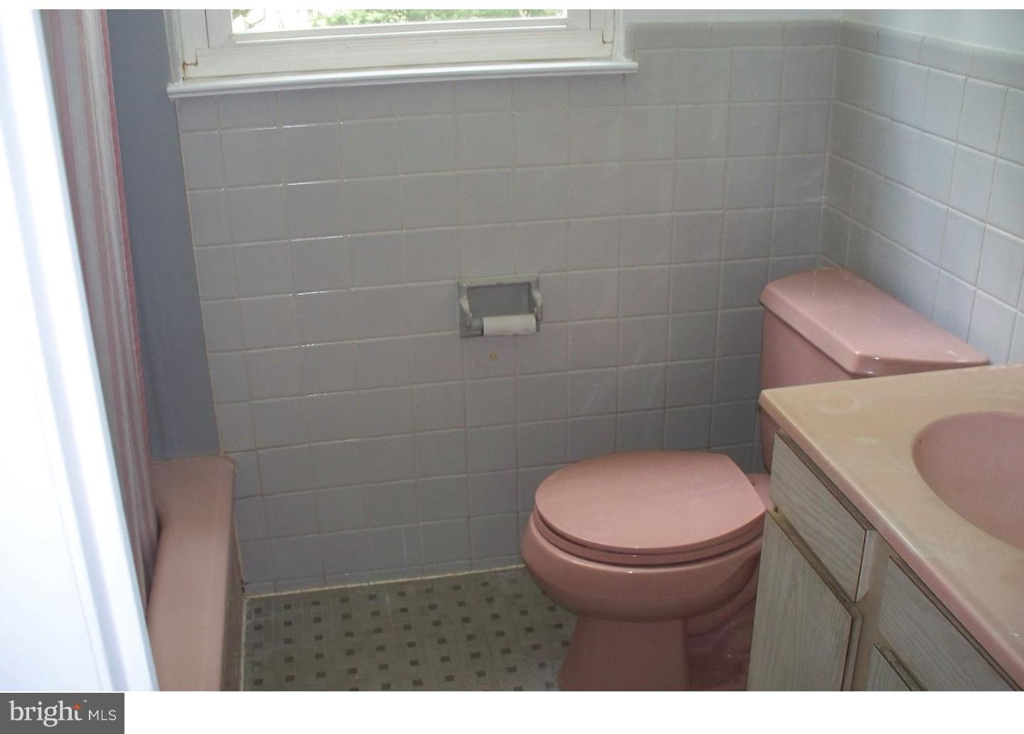 207 Spruce Road Flourtown, PA 19031 - Photo 13 of 19 a bathroom with a toilet and a sink