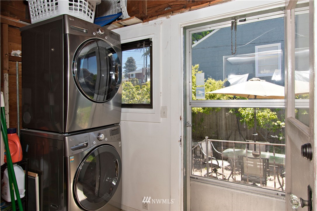 7501 California Avenue Southwest Seattle, WA 98136 - Photo 11 of 25 a utility room with dryer and washer