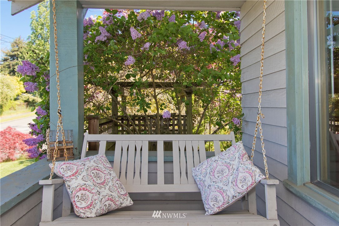 7501 California Avenue Southwest Seattle, WA 98136 - Photo 21 of 25 a view of a porch with a bench