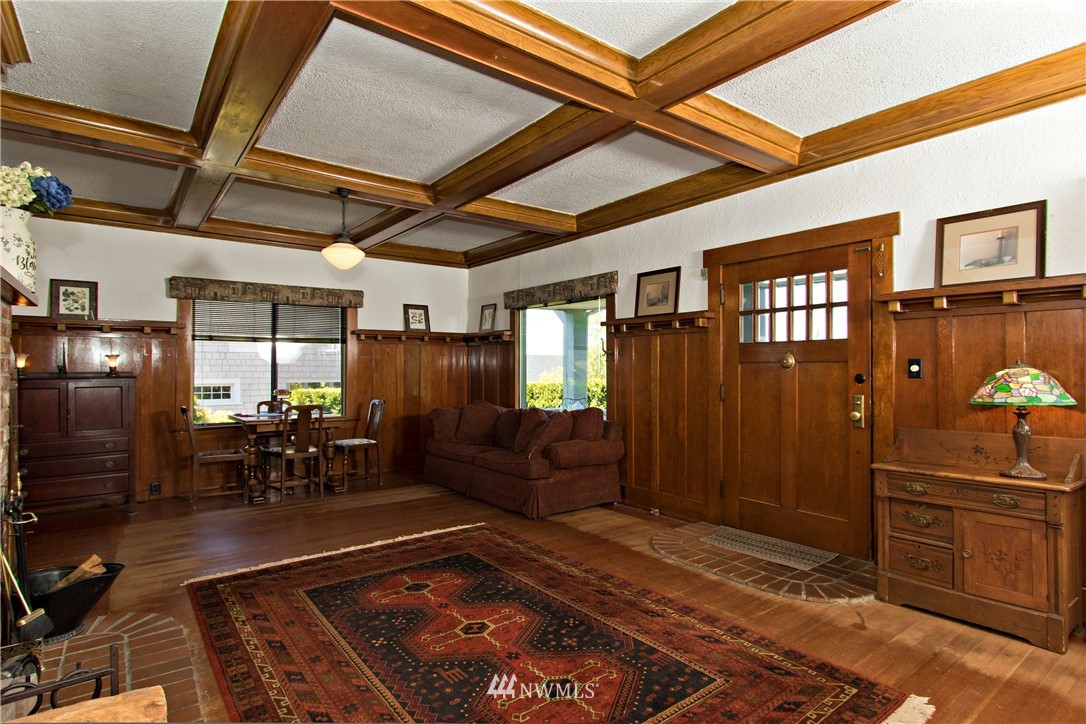 7501 California Avenue Southwest Seattle, WA 98136 - Photo 5 of 25 a living room with furniture a dining table and chairs with wooden floor
