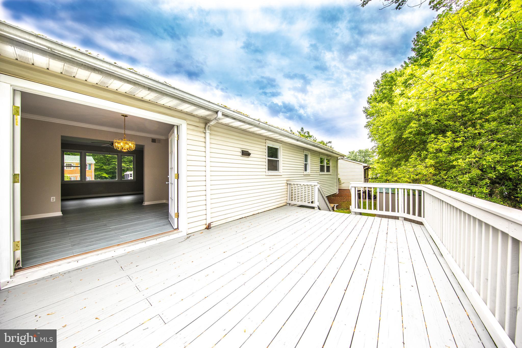 13806 Delaney Road Woodbridge, VA 22193 - Photo 2 of 10 Deck off the dining room with stairs to backyard