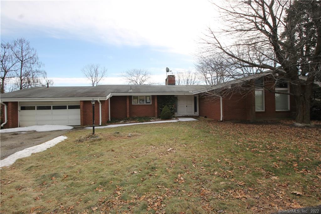 6 Ridge Road Derby, CT 06418 - Photo 1 of 1 a view of a house with a yard and garage