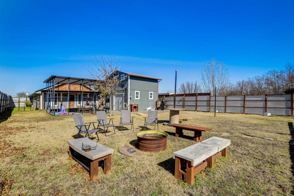 405 Hubbard Josephine, TX 75173 - Photo 15 of 17 a roof deck with table and chairs a barbeque