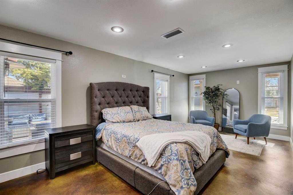 405 Hubbard Josephine, TX 75173 - Photo 9 of 17 a bedroom with a bed and a chair