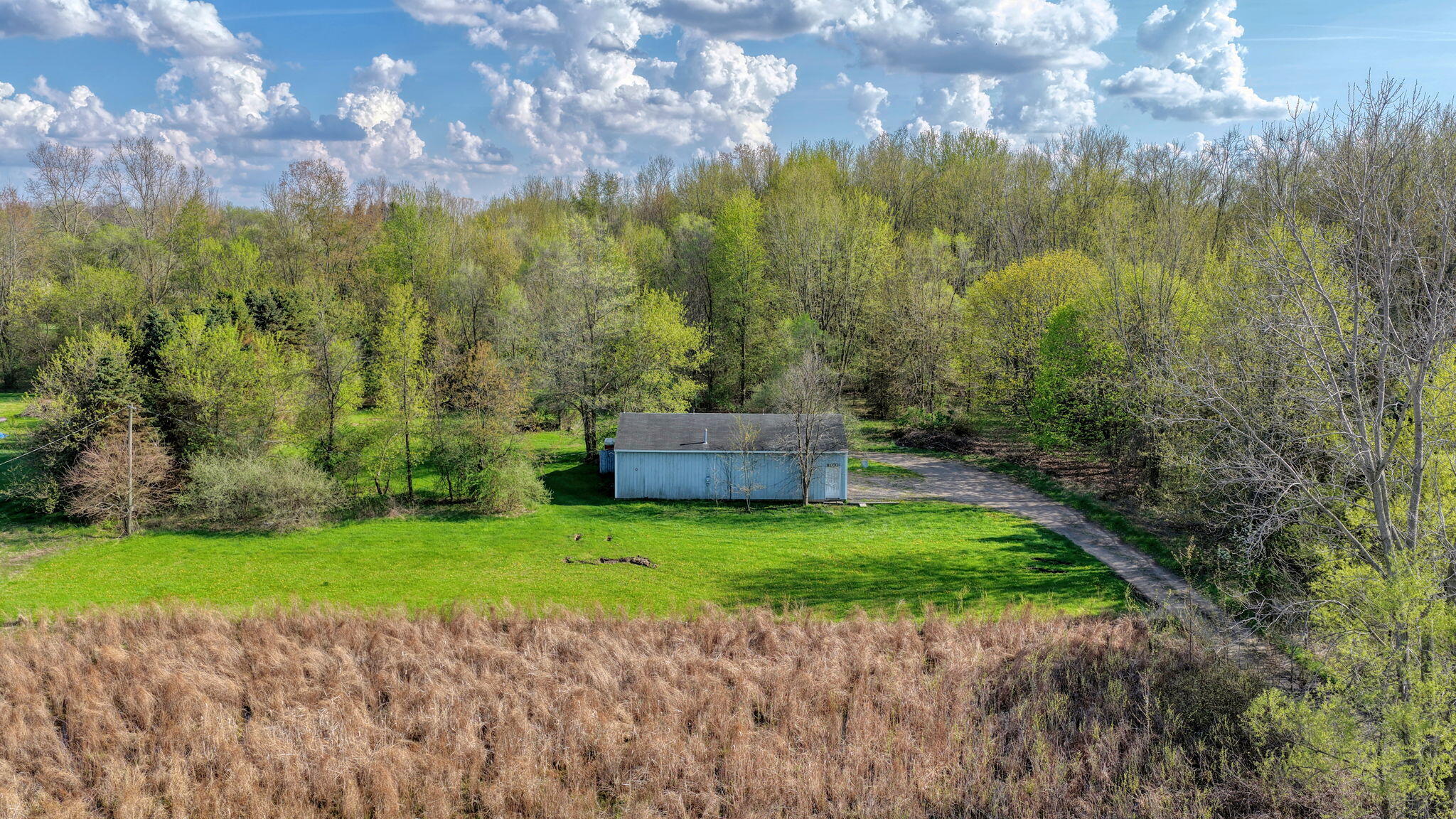 7001 Scio Church Road Ann Arbor, MI 48103 - Photo 5 of 33 4-web-or-mls-DJI_20260423172446_0862_D_H