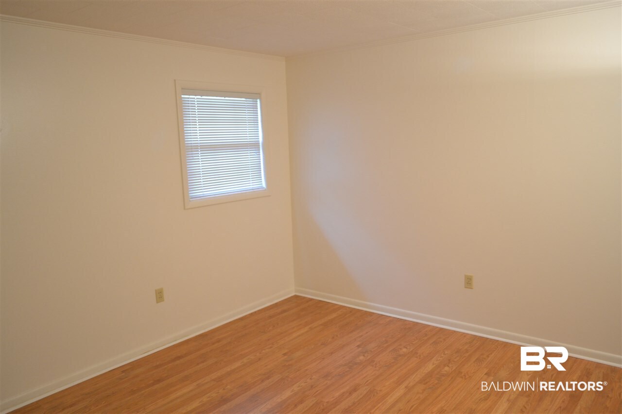 1525 North Alston Street Foley, AL 36535 - Photo 11 of 26 Bedroom 1 has a private bath.