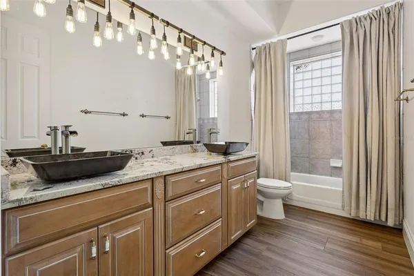 an aerial view of a house with a garden