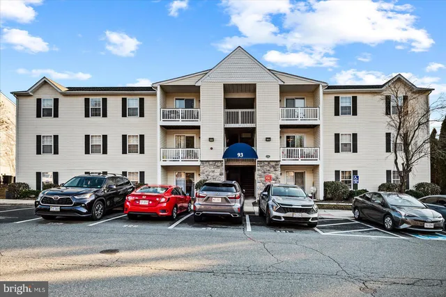 a view of a cars parked in front of a building
