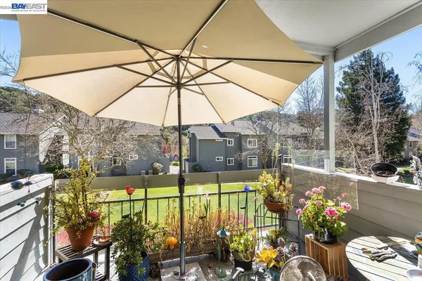 a view of a street with sitting area