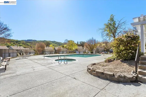 a view of a terrace with a yard
