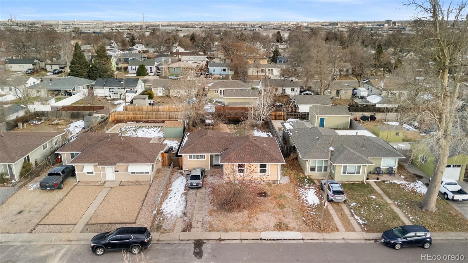 4956 Umatilla Street Denver, CO 80221 - Photo 23 of 33 an aerial view of residential houses with parking