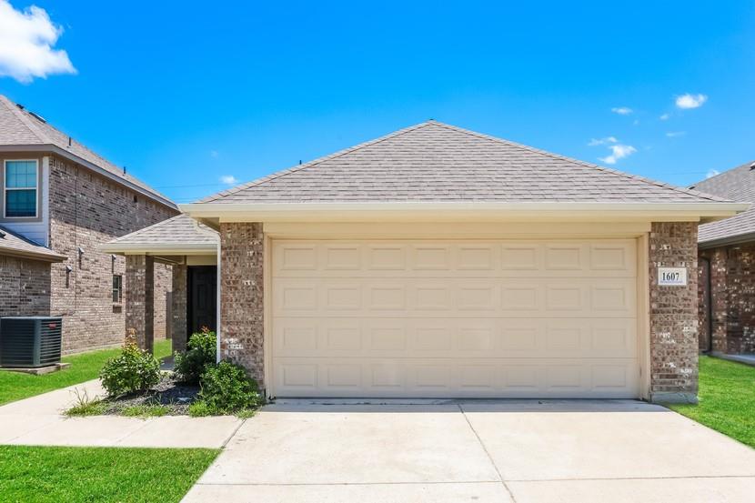 1607 Mark Lane Ennis, TX 75119 - Photo 1 of 1 a view of a house with backyard